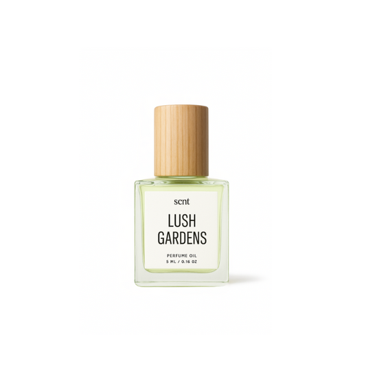 Perfume bottle labeled 'Lush Gardens' with a wooden cap on a white background